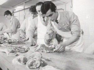 Cutting pork in the workshop