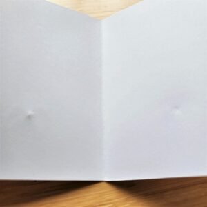 The bows had left marks across every single card.