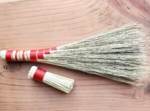 Luna’s handmade broom — turning simple materials into something useful and beautiful.